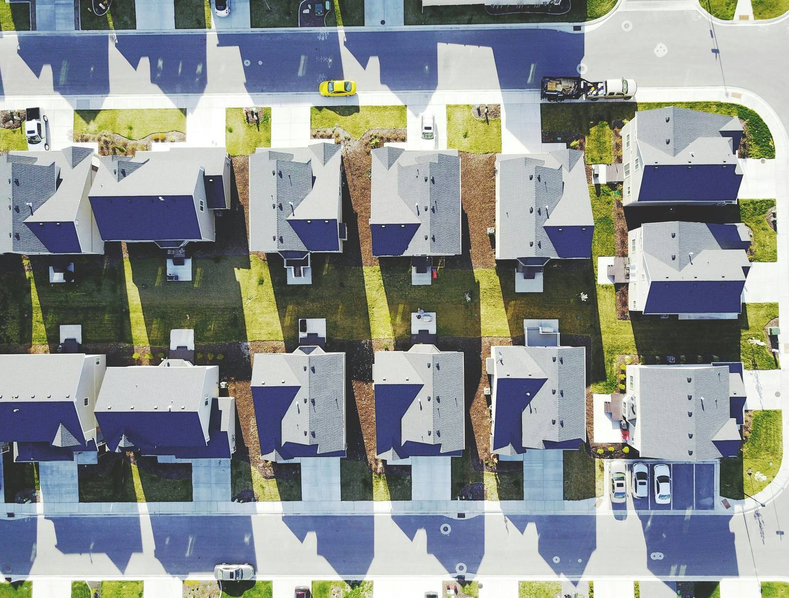 Aerial view of a Southern Maryland neighborhood with homes and tree cover